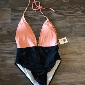 Halter, pink top, black bottom, one piece swimsuit